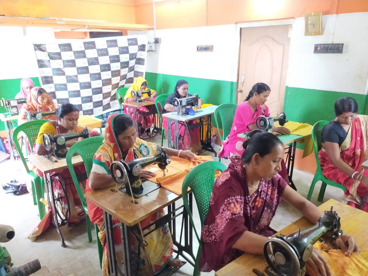 Women taking part in sewing training