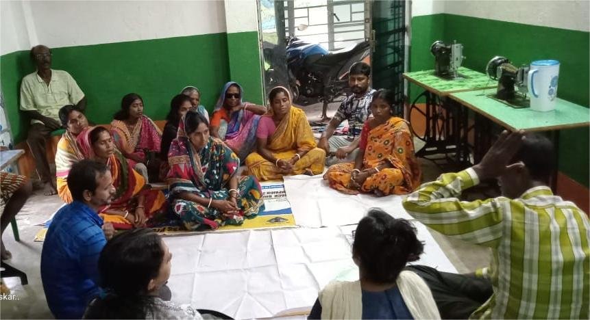 Women gathered for a community group session