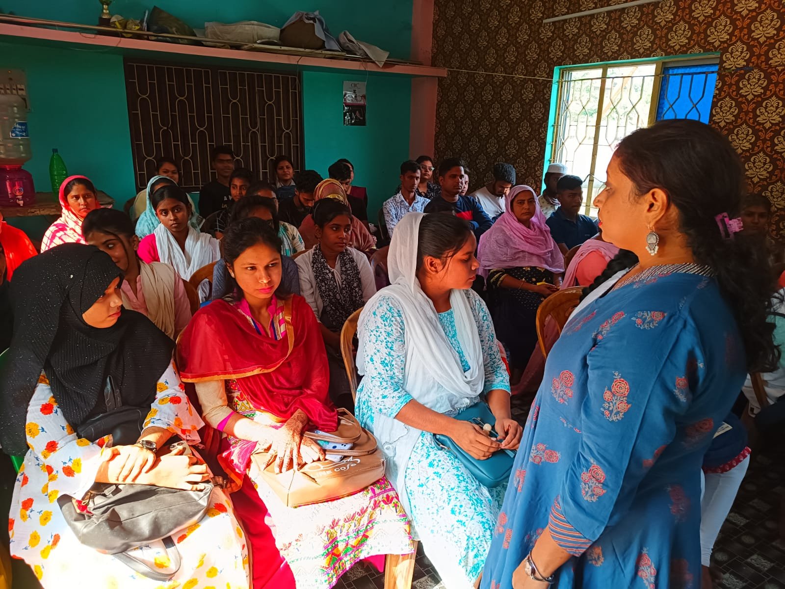 Community members gathered for an awareness meeting