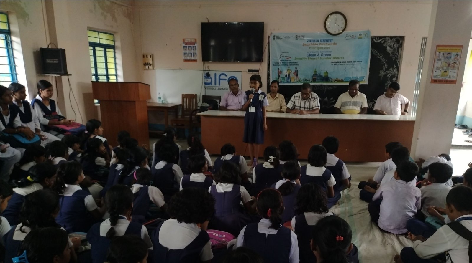 Women gathered for a community awareness discussion